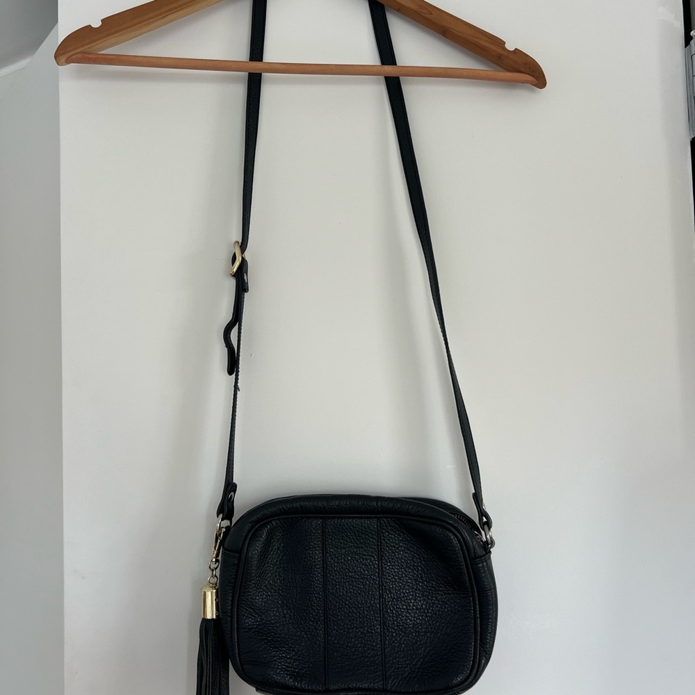 Classic Black Leather Crossbody Bag with Tassel Accent